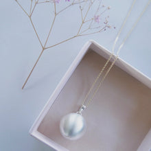 Load image into Gallery viewer, satin hallmarked sterling silver Mexican bola pregnancy necklace with 9ct gold bail and chain