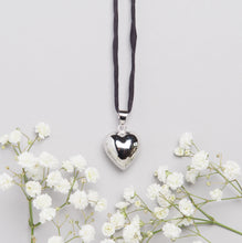 Load image into Gallery viewer, silver plated heart shaped Mexican bola pregnancy necklace with black hand dyed silk cord