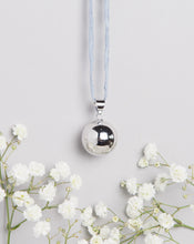 Load image into Gallery viewer, polished silver plated Mexican bola pregnancy necklace on light grey hand dyed silk cord
