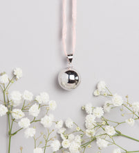 Load image into Gallery viewer, polish silver plated Mexican bola pregnancy necklace on baby pink hand dyed silk cord