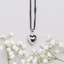 Load image into Gallery viewer, silver plated heart shaped Mexican bola pregnancy necklace with black hand dyed silk cord

