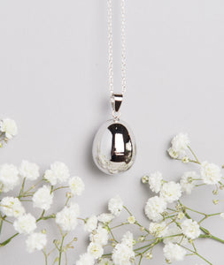 silver plated pebble Mexican bola pregnancy necklace 