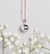 Load image into Gallery viewer, polish silver plated Mexican bola pregnancy necklace on baby pink hand dyed silk cord
