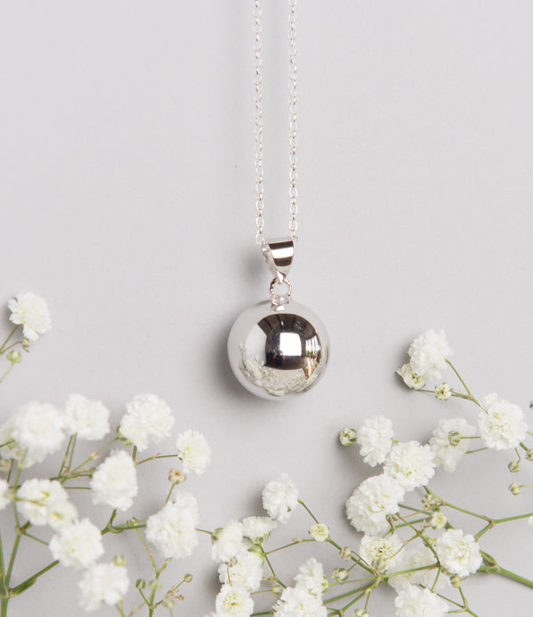 polished silver plated Mexican bola pregnancy necklace 